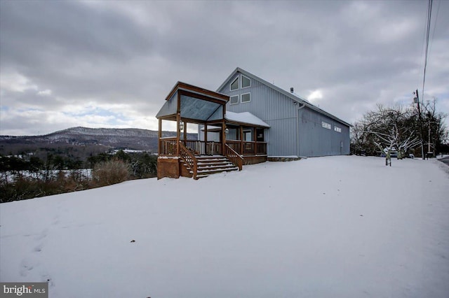 view of front of property with a mountain view