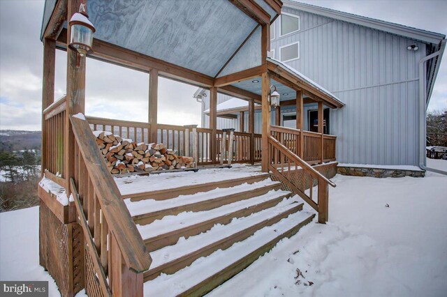 view of snow covered deck