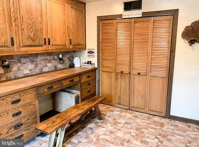 kitchen featuring backsplash