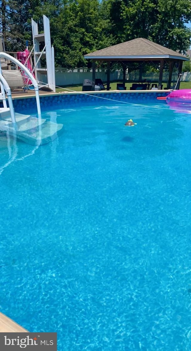 view of pool featuring a gazebo