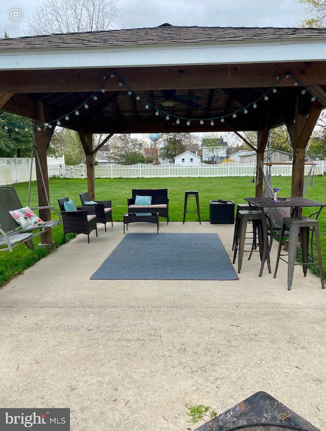 view of home's community featuring a gazebo, a yard, and a patio