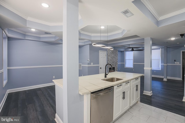 kitchen with white cabinets, dishwasher, crown molding, and sink