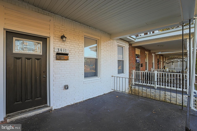 property entrance with a porch