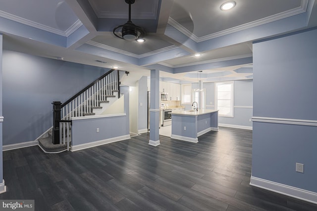 living room featuring sink, ornamental molding, dark wood-type flooring, and coffered ceiling