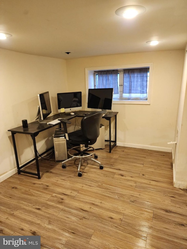 office area with light wood-type flooring