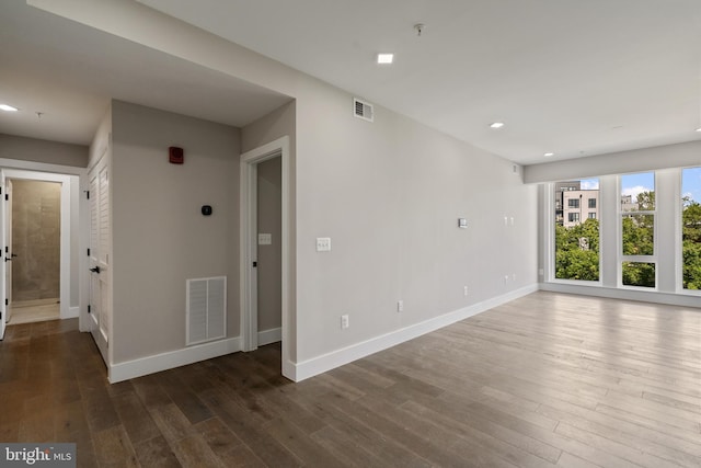 unfurnished room featuring hardwood / wood-style floors