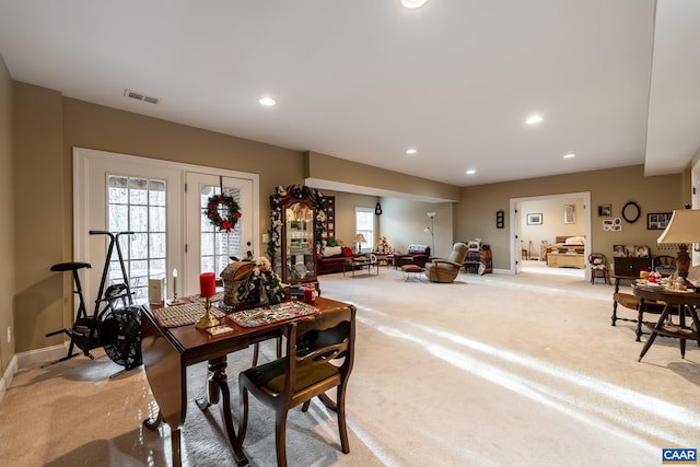 view of carpeted dining area