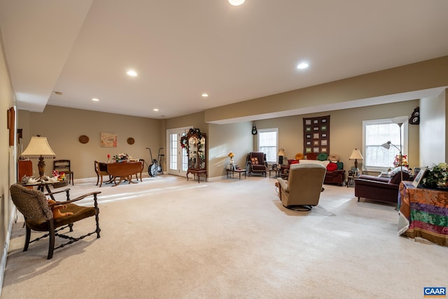 living room featuring light colored carpet