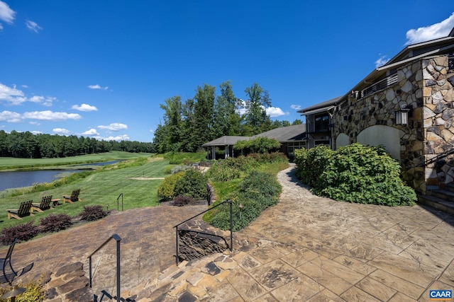 view of patio / terrace featuring a water view