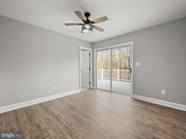 unfurnished room featuring ceiling fan and wood-type flooring