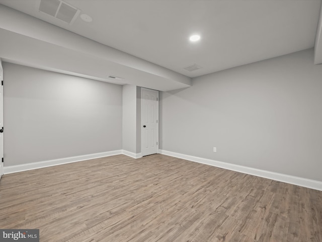 basement with light wood-type flooring