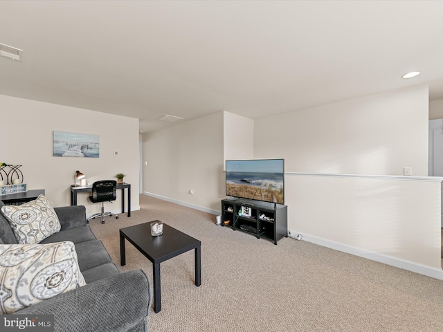 living room featuring light carpet