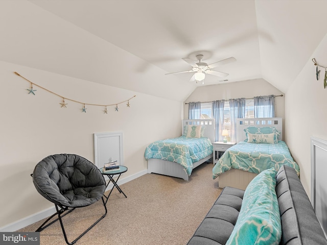 bedroom with ceiling fan, carpet, and lofted ceiling