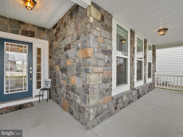 property entrance featuring covered porch