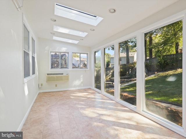 unfurnished sunroom with lofted ceiling with skylight and a wall mounted AC