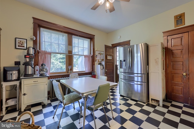 dining room featuring ceiling fan