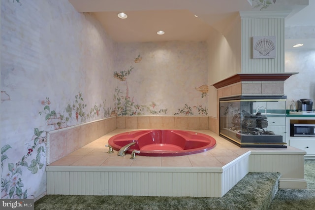 bathroom featuring a tub to relax in