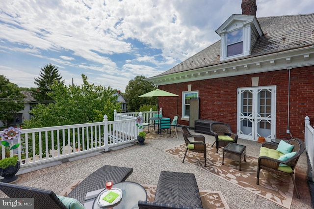 view of patio / terrace with french doors and an outdoor hangout area