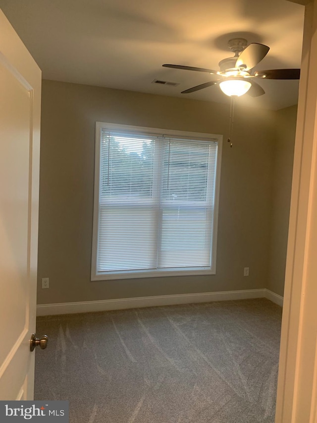 225 Wildwood Rd, Colonial Beach, VA 22443 - spare room featuring carpet flooring and a ceiling fan