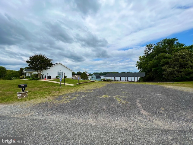 225 Wildwood Rd, Colonial Beach, VA 22443 - view of front of home featuring a front yard and gravel driveway
