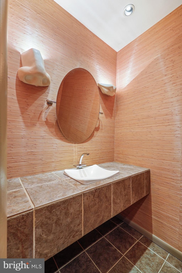 bathroom featuring tile patterned floors and sink