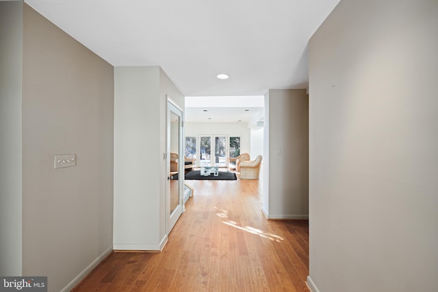 corridor featuring light wood-type flooring