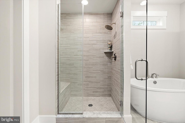 bathroom with independent shower and bath