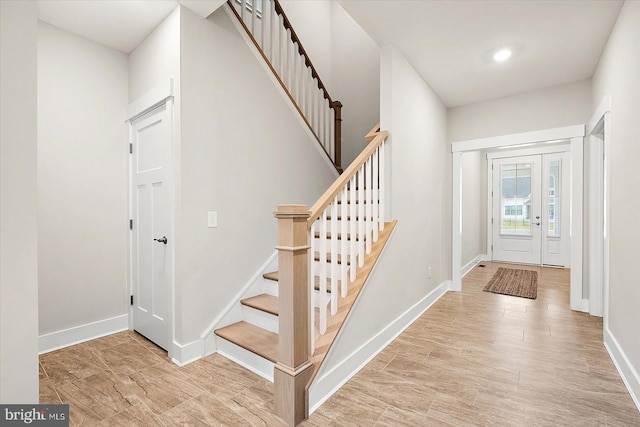 foyer entrance featuring light wood-type flooring