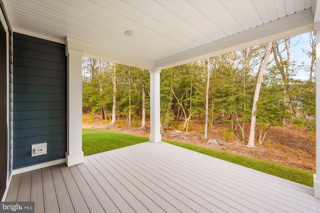 deck featuring a yard