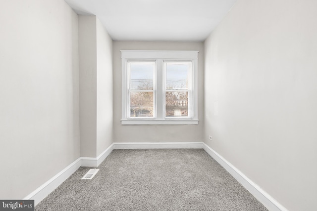 empty room with carpet floors