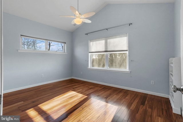 unfurnished room featuring dark wood-type flooring, ceiling fan, and lofted ceiling