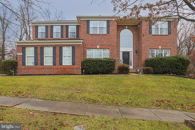 view of front of home with a front yard