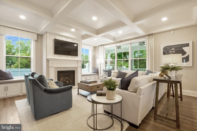 living room with hardwood / wood-style floors, beam ceiling, and coffered ceiling