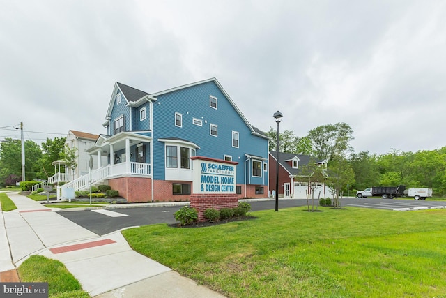 exterior space featuring a front yard