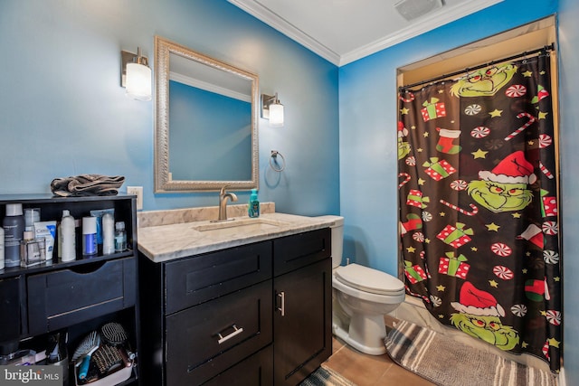 bathroom featuring tile patterned floors, vanity, toilet, and ornamental molding