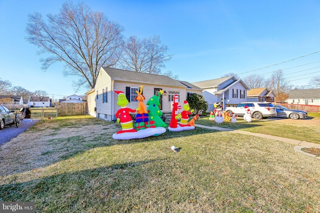 view of front of home featuring a front lawn