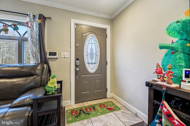 tiled entrance foyer with crown molding