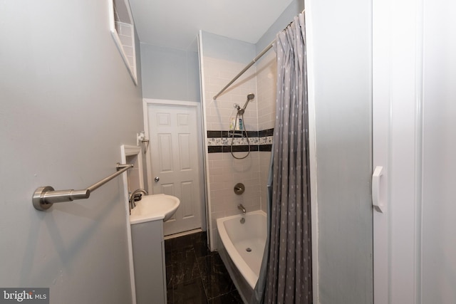 bathroom with vanity and shower / bathtub combination with curtain