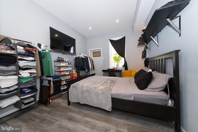 bedroom featuring wood-type flooring