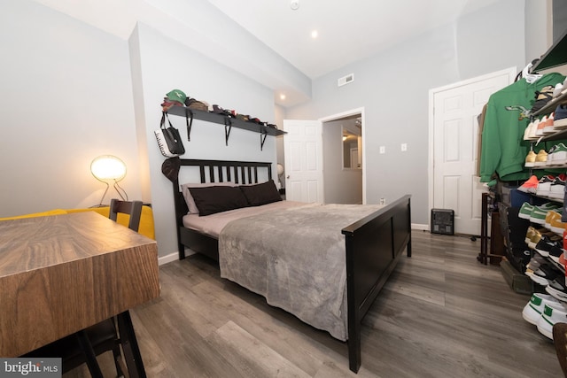 bedroom featuring hardwood / wood-style flooring