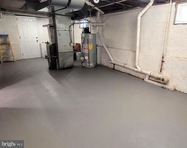 basement with heating unit and gas water heater