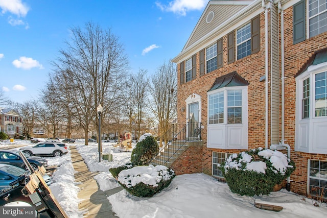 view of snow covered patio