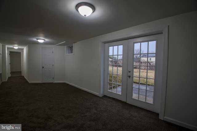 doorway featuring dark colored carpet, french doors, and baseboards