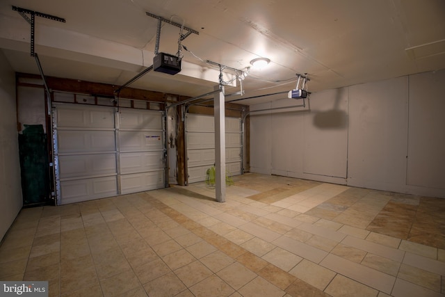 garage featuring a garage door opener