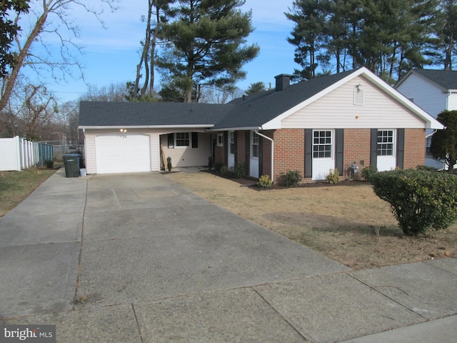 ranch-style home with a garage