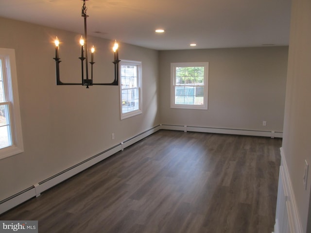 unfurnished dining area with dark wood-type flooring and a notable chandelier