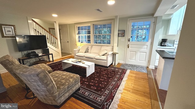 living room featuring light wood-type flooring