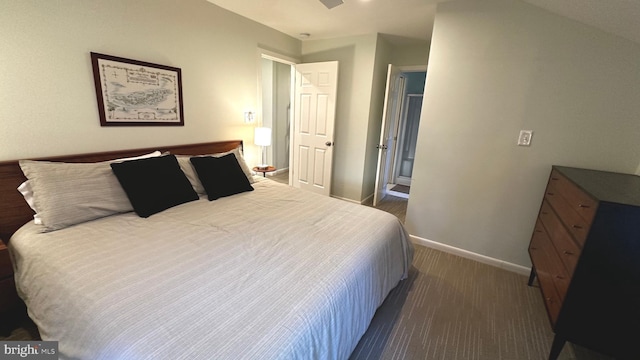 bedroom with vaulted ceiling