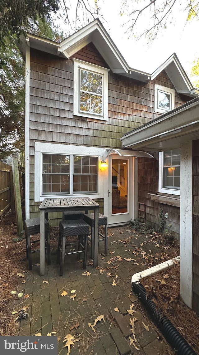 rear view of house featuring a patio