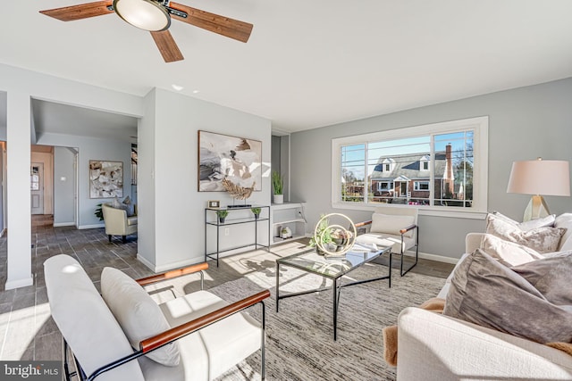 living room featuring ceiling fan